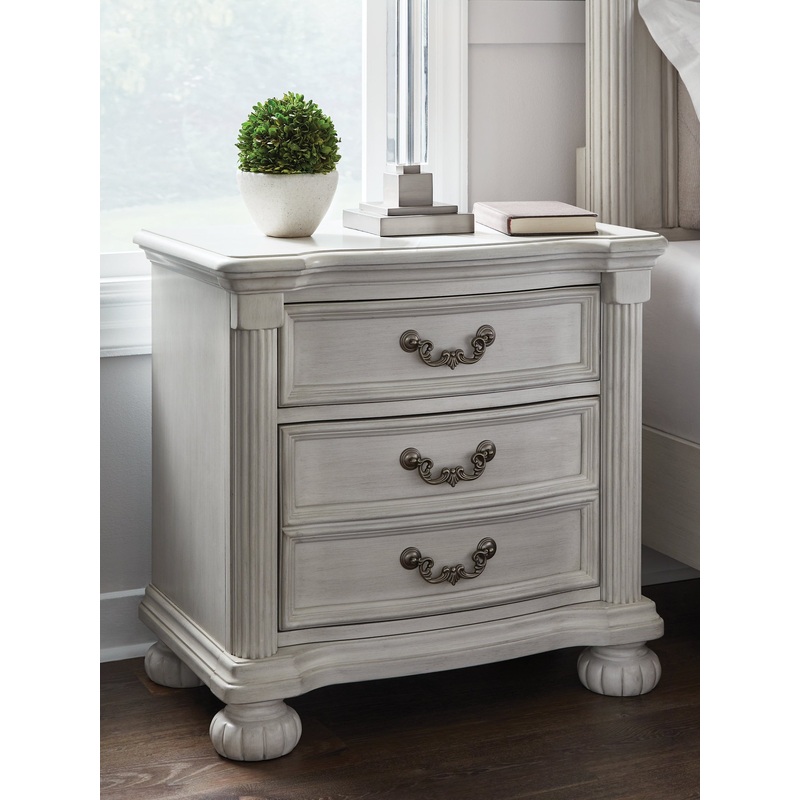 Ashley Express – Montelaine Three Drawer Night Stand